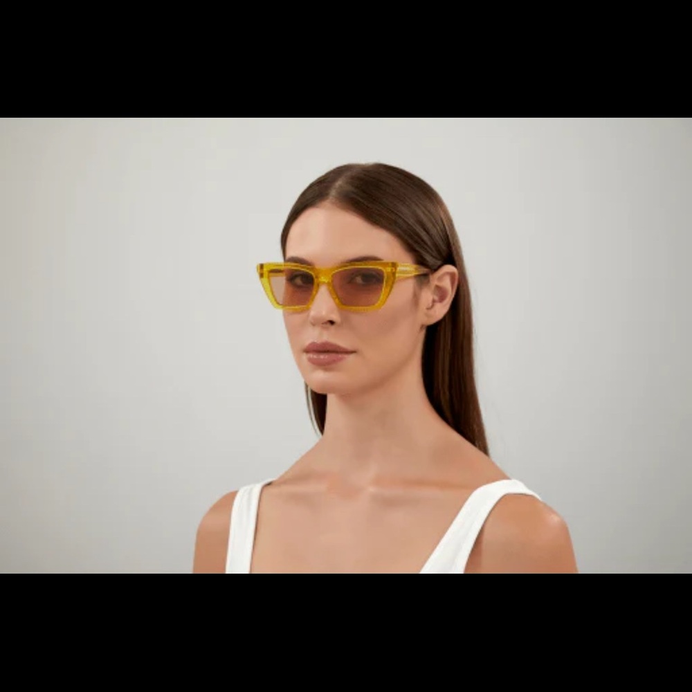 Yellow Saint Laurent sunglasses